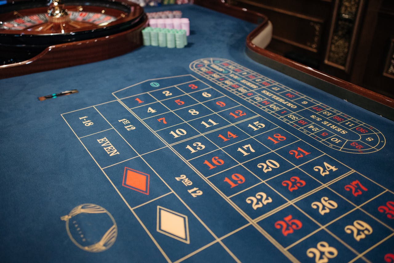 home-hero Luxurious casino setting with a roulette table ready for high-stakes gaming sessions.