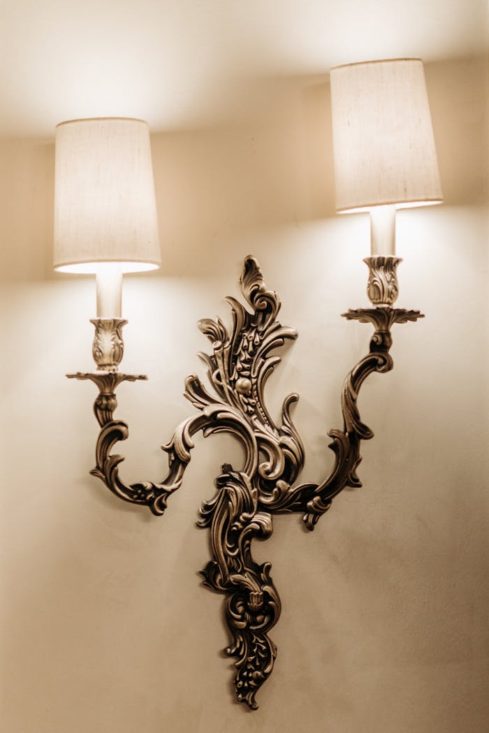 services-03 Ornate Victorian sconce lighting with intricate baroque designs, exuding elegance and vintage charm.